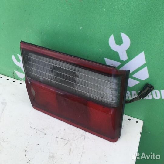 Фонарь задний внутренний левый Тойота Карина Е