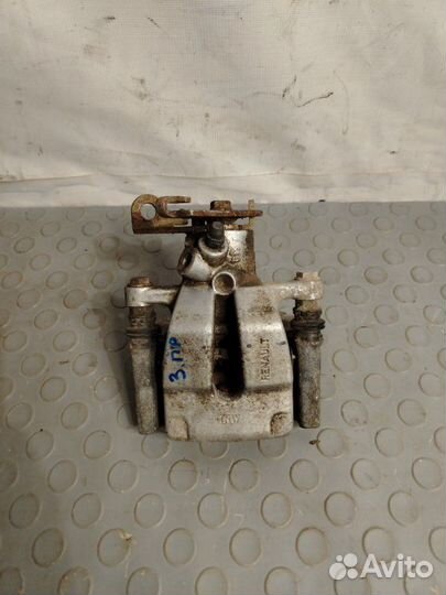 Суппорт задний левый Renault Fluence седан K4M