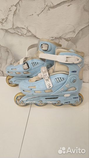 Роликовые коньки