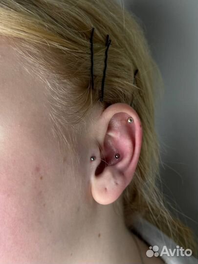 Мастер пирсинга