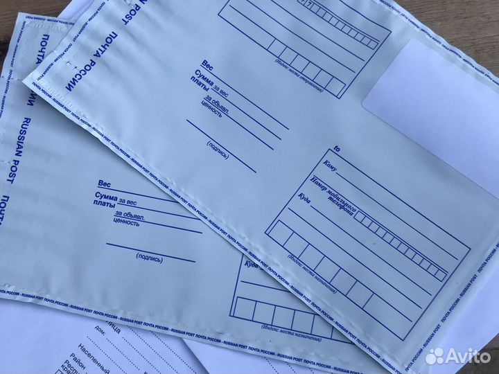 Конверты почтовые бумажные и клеенчатые