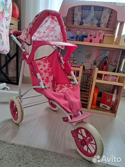 Игрушечная коляска для кукол