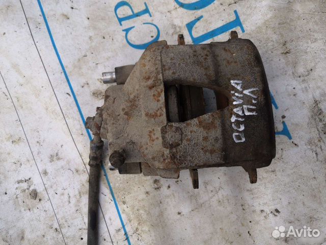 Передний левый тормозной суппорт Scoda Octavia A4