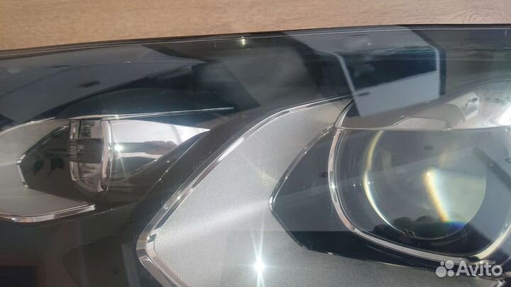 Фара левая Volkswagen Touareg NF