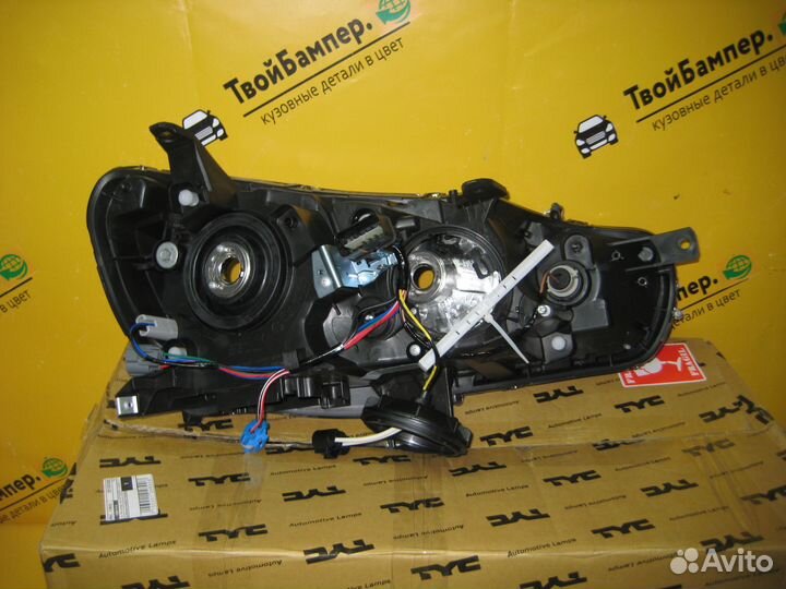 Фара левая Mitsubishi Lancer 10 под эл кор