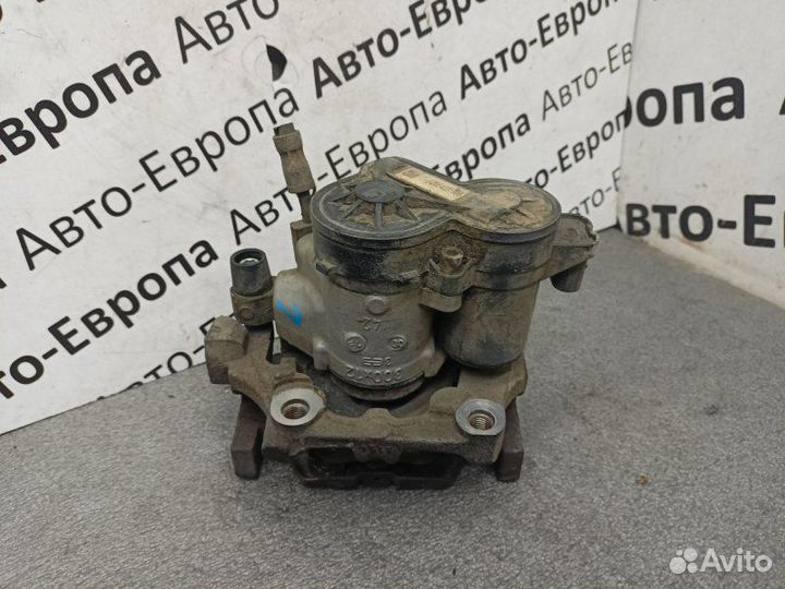 Суппорт с электроручником задний левый