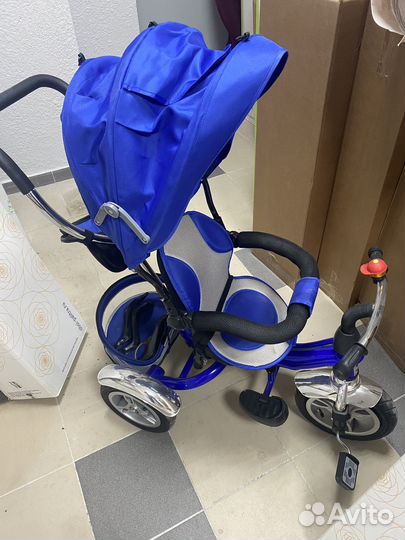 Трехколесный велосипед с ручкой