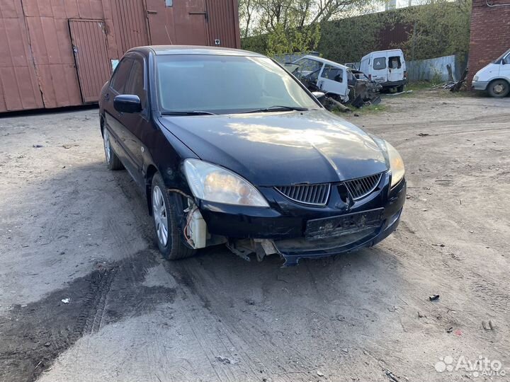 Стеклоподемник задний левый Mitsubishi Lancer 9