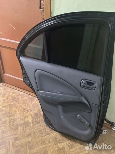 Дверь задняя левая Nissan almera classic B10