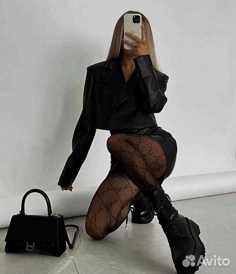 Женский юбочный костюм из эко-кожы.M(44-46)