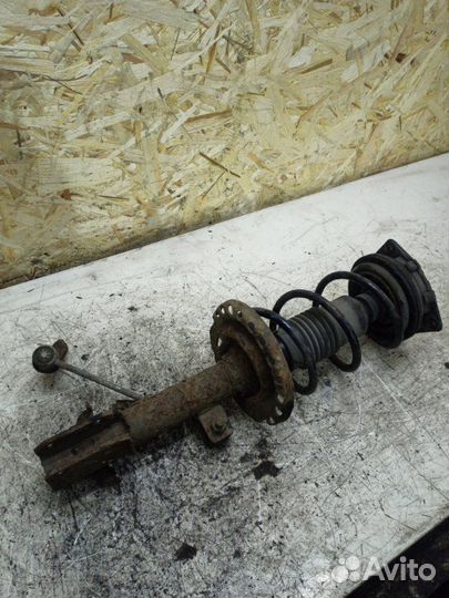 Стойка подвески передняя левая Nissan Note минивэн