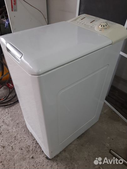 Стиральная машина с вертикальной загрузкой канди