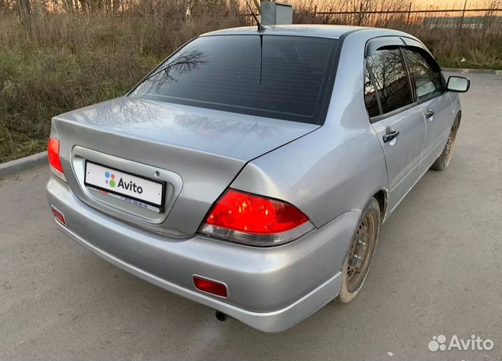 Mitsubishi Lancer 1.3 МТ, 2003, 392 000 км