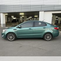 Kia Rio 1.6 AT, 2012, 206 000 км, с пробегом, цена 915 000 руб.