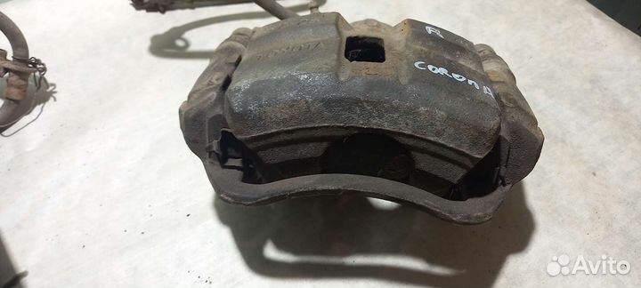 Суппорт передний правый Toyota CoronaT190