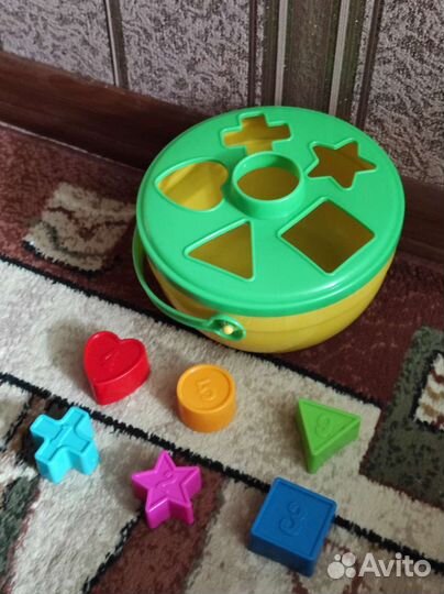 Погремушки, развивающие игрушки