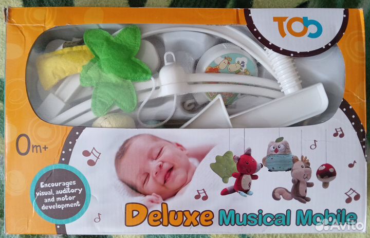 Музыкальный мобиль на кроватку