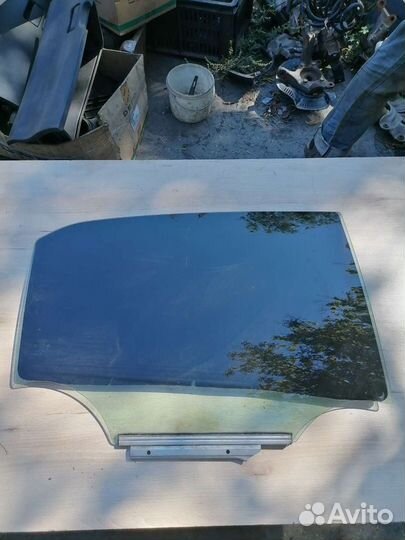 Стекло заднее Toyota Corolla E150