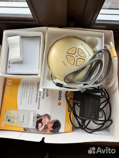 Молокоотсос medela электрический swing flex