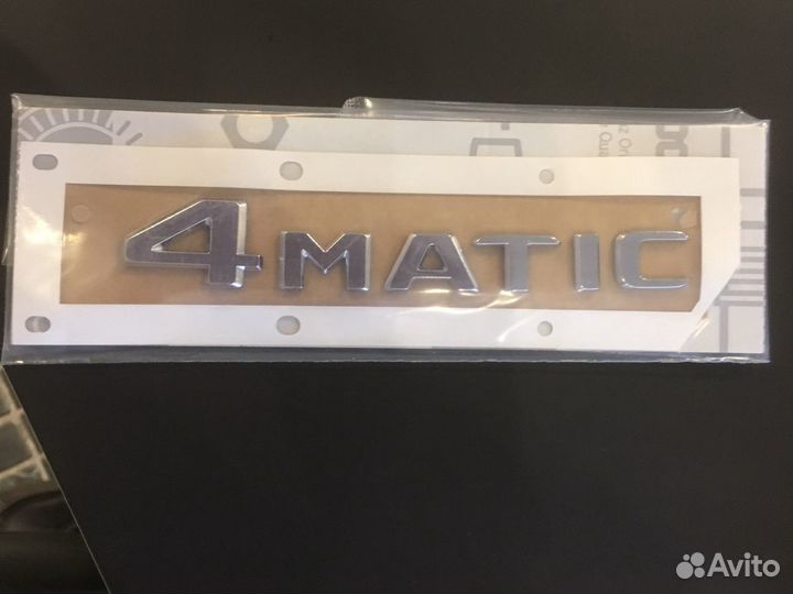 Эмблема крышки багажника 4matic