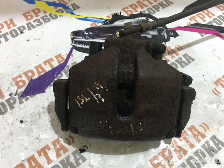 Фольксваген Пассат Суппорт передний Лев