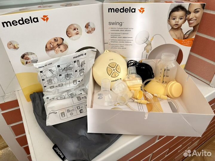 Молокоотсос medela swing электрический + пакеты