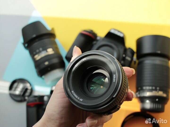 Зеркальный фотоаппарат Nikon с объективом