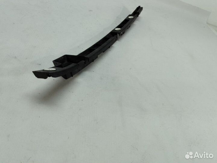 Кронштейн усилителя бампера задний левый Opel