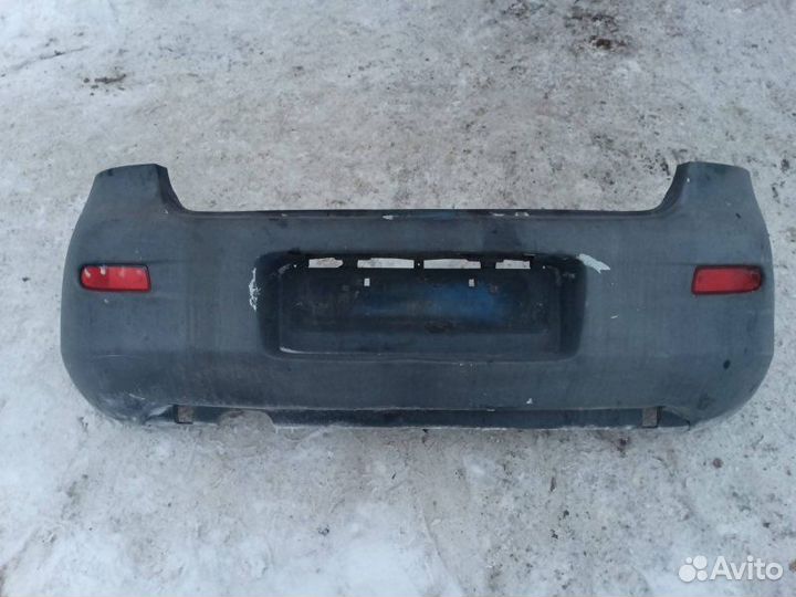 Бампер задний Mazda 323 BA 1996