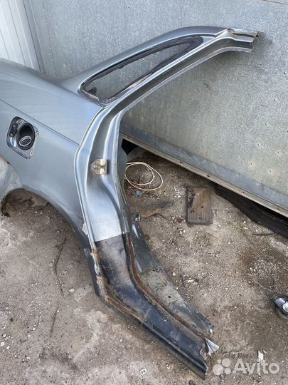Заднее крыло Лада Приора