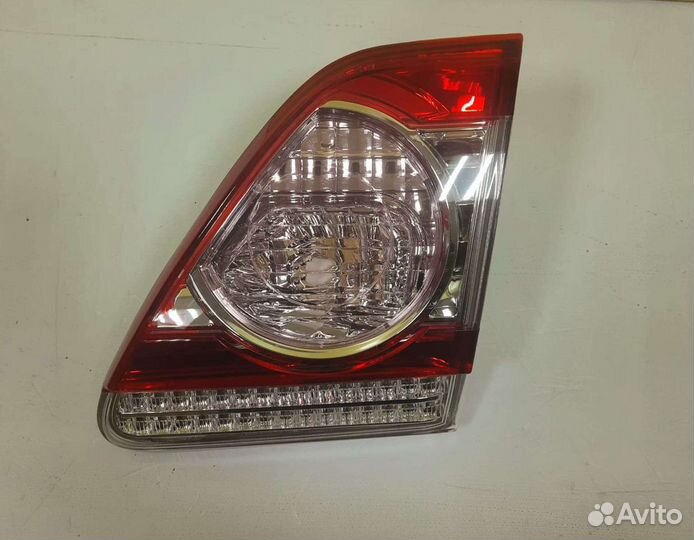 Фонарь левый внутр. кр. баг.Toyota Corolla E15