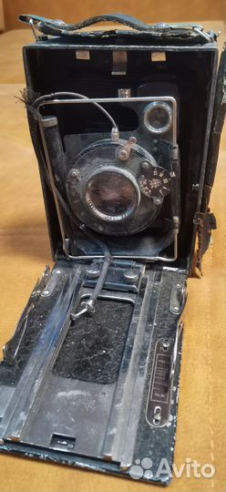 Антикварный фотоаппарат