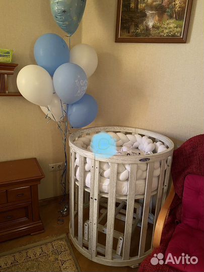 Детская кроватка с универсальным маятником