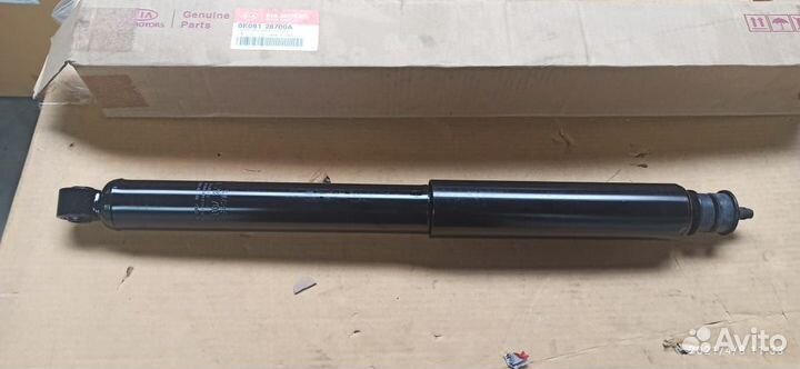 Амортизатор Kia Sportage 0K08128700A