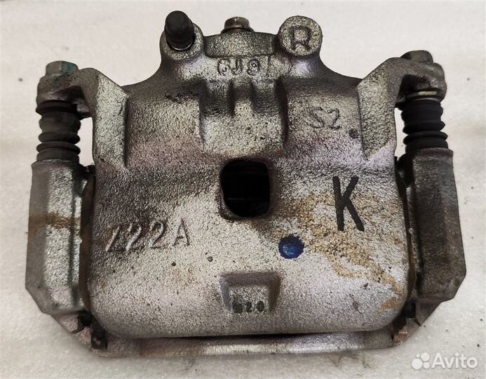 Суппорт тормозной передний правый Nissan Note E