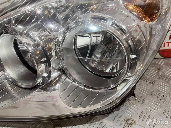 Фара левая Opel Astra H