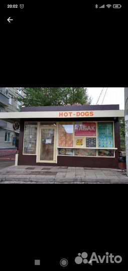 Продавец хот догов