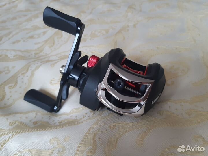 Мультипликаторная катушка shimano DW128R