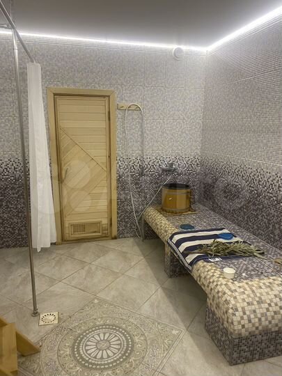 Коттедж 411 м² на участке 15 сот.