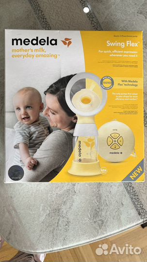 Молокоотсос medela электрический