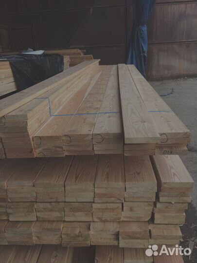 Домостроение с досками из лиственницы