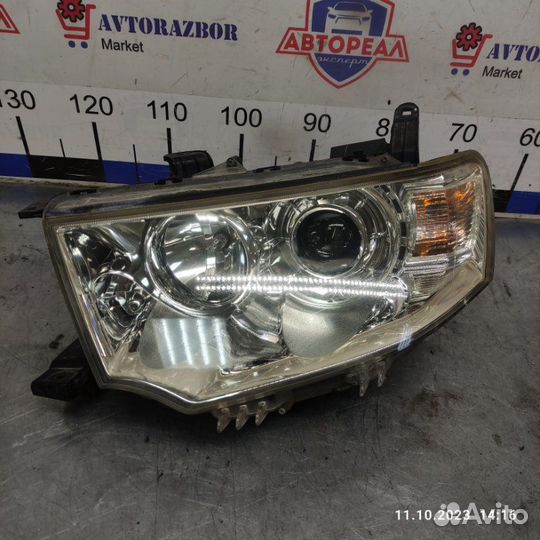 Фара передняя левая Mitsubishi Pajero Sport 2 4D56