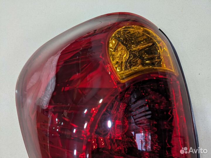 Фонарь задний левый mitsubishi L200 2006-2014