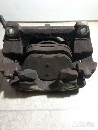 Суппорт тормозной передний левый Renault Laguna 2