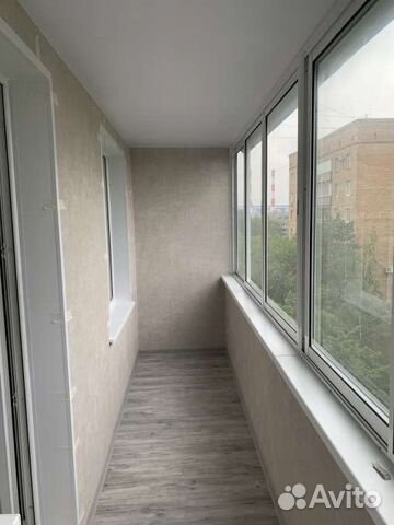 Балкон под ключ, остекление и отделка балкона
