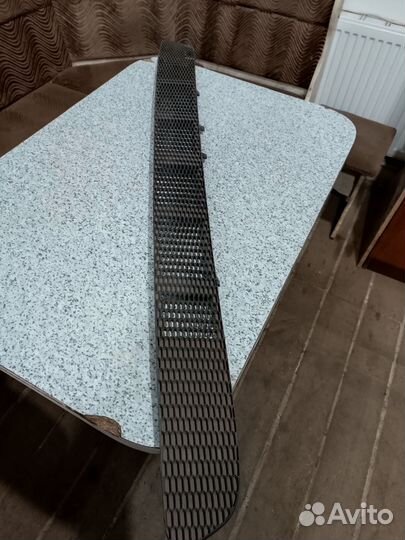 Заглушка(решётка) бампера Nissan Almera N16