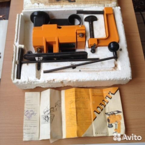 Приспособление