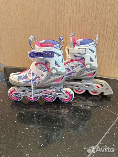 Ролики раздвижные 31-36 размер Reaction