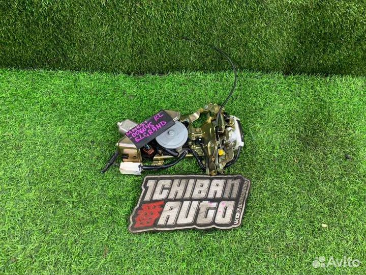 Замок двери задний левый Nissan Elgrand MNE51