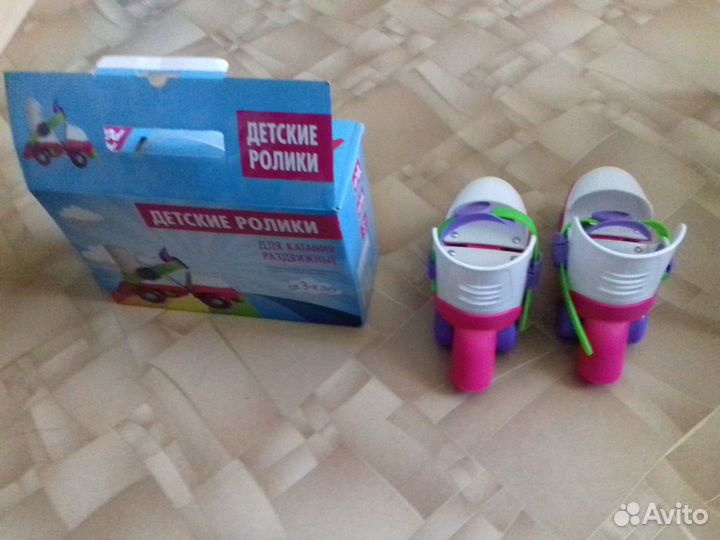 Коньки роликовые